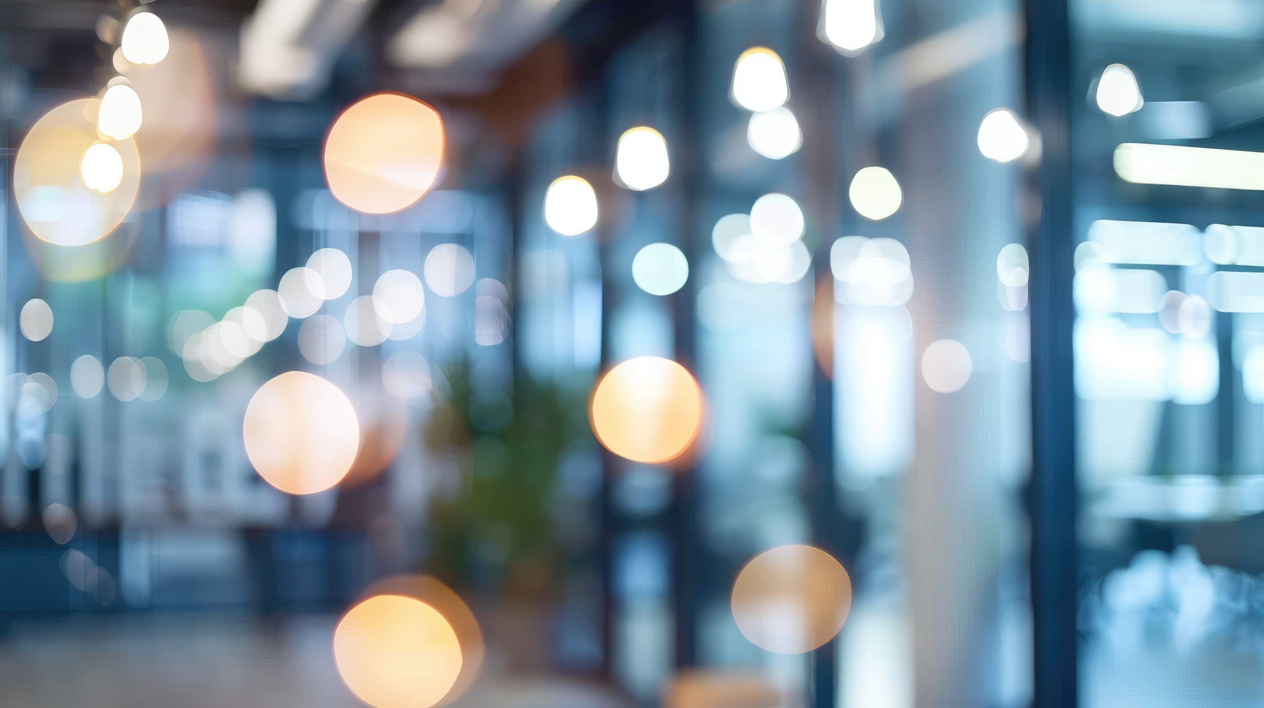 Blurred empty open space office. Abstract light bokeh at office interior background for design